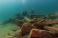 Munising, MI -August 14th, 2021: SCUBA divers exploring wooden steamer shipwreck