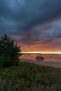 Munising Michigan, USA - August 11, 2021: Pontoon boat anchored near a beach