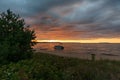 Munising Michigan, USA - August 11, 2021: Pontoon boat anchored near a beach