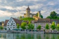 The munot fortress in the swiss city schaffhausen is reflected on the rhine river during sunset in summer....IMAGE