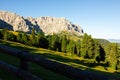 Munt de Fornella, rustic fence and alpine meadow in Dolomites mountains. Beauty of mountains world, South Tyrol, Italy Royalty Free Stock Photo