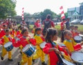 Marching Band Of Elementary School Students With Colorful Costumes Royalty Free Stock Photo