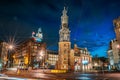 Munttoren or Mint Tower or Munt in Amsterdam historical center at night, Netherlands Royalty Free Stock Photo