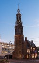 The Munttoren- Mint Tower Muntplein square, where the Amstel river and the Singel canal meet, Amsterdam, Netherlands. Royalty Free Stock Photo