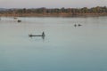 Muong Khong Laos 1.12.2012 Mekong river at sunset with and fishing boat and nets Royalty Free Stock Photo