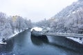 Mur river with Murinsel bridge in Graz, Steiermark region, Austria, with snow, in winter