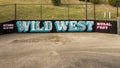Mural advertising the seventh annual Wild West Mural Fest in Dallas, Texas. Royalty Free Stock Photo