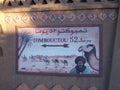 Mural in african Zagora town in Morocco, means: 52 days to Timbuktu in Mali on foot or camel Royalty Free Stock Photo