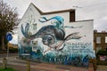 A mural by artist Hera for an ocean pollution awareness campaign called Rise Up Residency