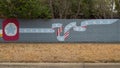 Mural on a barrier wall between Forest Lane and the neighborhood on the North side, painted in 1976 by art students.