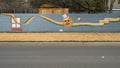 Mural on a barrier wall between Forest Lane and the neighborhood on the North side, painted in 1976 by art students.