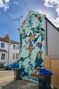 A mural by Catherine Chinatree for an ocean pollution awareness campaign called Rise Up Residency