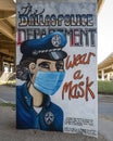 Mural by Dallas police officer Cat Lafitte in the Art Park of Deep Ellum under Good-Latimer Expressway in Dallas, Texas.
