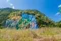 Mural de la Prehistoria The Mural of Prehistory painted on a cliff face in the Vinales valley, Cuba