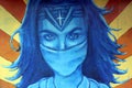 Mural of a female comic hero in medical mask. Vancouver, British Columbia