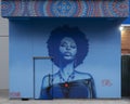 Mural by Isaac Davies featuring Dallas vocalist N`Dambi, part of the Blues Alley project in Deep Ellum, Texas.