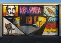 Mural by Jeremy Navarrete on an outside wall of a Krav Maga training center in Fayetteville, Arkansas.