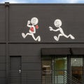 Mural by Kai featuring his Imaginary Friend on an outside wall of Markowicz Fine Art in Dallas, Texas.