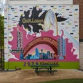 Mural outside 2929 Wycliff Apartments featuring Oak Lawn, Lucas B&B Restaurant, Lucky\'s Cafe and the Historic West End.