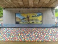 Mural painting of the river under the toll road bridge housing Bogor Raya