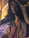 Mural painting of woman with a ambiguous look