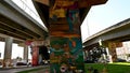 Mural paintings and makeshift graveyard at Chicano Park San Diego