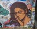 Mural of a pensive beautiful woman by