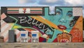 Mural by portrait artist Brandon Adams on the 7-Eleven store on Botham Jean Boulevard in Dallas, Texas.