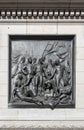 Mural sculpture at Nelson`s Column, Trafalgar Square, London, UK