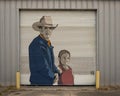 Mural titled `Generations` by Fernando Rojas for the Wild West Mural Fest in Dallas, Texas.