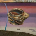 Mural titled `Mississippian Frog` by painter and muralist Yatika Starr Fields in 2020 in Fayetteville, Arkansas.