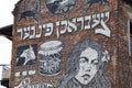 Mural on the wall of old building in jewish district of Krakow