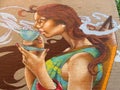 Mural of a Woman Sipping Coffee in Georgetown Royalty Free Stock Photo