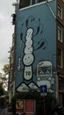 murales on a building of jordaan in amsterdam