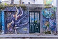 Murals of an ocotopus and a cat by Fabio Carneiro in Aveiro