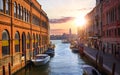 Murano island, Venice, Veneto, Italy. Channel with boats sunset