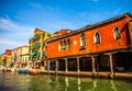 MURANO, ITALY - AUGUST 19, 2016: Famous architectural monuments and colorful facades of old medieval buildings close-up Royalty Free Stock Photo