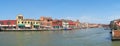Murano, Venezia, Italy. View at canal with boats and the traditional houses