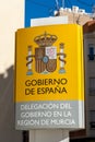 Vertical view of the sign of the Spanish government in Murcia