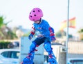 Murcia, Spain, July 17, 2019: An adorable preschooler weepy because her plastic roller blades made her fall.