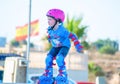 Murcia, Spain, July 17, 2019: An adorable preschooler weepy because her plastic roller blades made her fall.