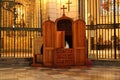 Old wooden confessional in the cathedral of Murcia