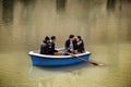 Group of young people sailing in rowing boat in Murcia