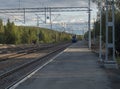 Murjek, Norrbotten, Sweden, Agust 22, 2019: view on railway line with arriving Norrtag passenger train to Kiruna. Train station at