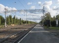 Murjek, Norrbotten, Sweden, Agust 22, 2019: view on railway line at Train station at Murjek with arrival signpost. Swedish Lapland