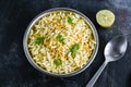 Murmura spicy puffed rice, pori Jhal Muri, Borugulu and lemon, in Tamil nadu Karnataka, India.