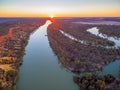 Murray River flowing to the horizon at beautiful sunset. Royalty Free Stock Photo