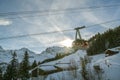 Cable car full of tourists between Murren and Birg in Swiss Alps