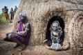 Mursi women in their hut