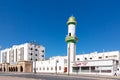 Muscat, Oman - December 17, 2018: minaret over houses on a city street